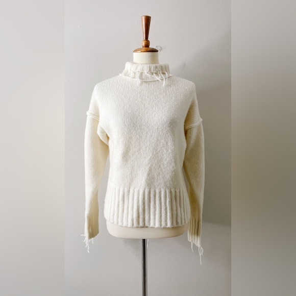 NSF Kori Distressed Fringe Wool Blend Turtleneck Sweater in Ivory Cream - Picture 2 of 7